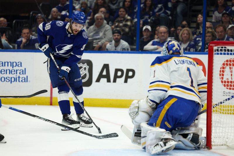 Feb 29, 2024; Tampa, Florida, USA;  Tampa Bay Lightning left wing Brandon Hagel (38) controls the puck against the Buffalo Sabres in the first period at Amalie Arena. Mandatory Credit: Nathan Ray Seebeck-USA TODAY Sports