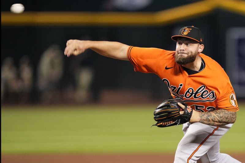 Sep 2, 2023; Phoenix, Arizona, USA; Baltimore Orioles relief pitcher Joey Krehbiel (52) pitches against the Arizona Diamondbacks during the ninth inning at Chase Field. Mandatory Credit: Joe Camporeale-USA TODAY Sports