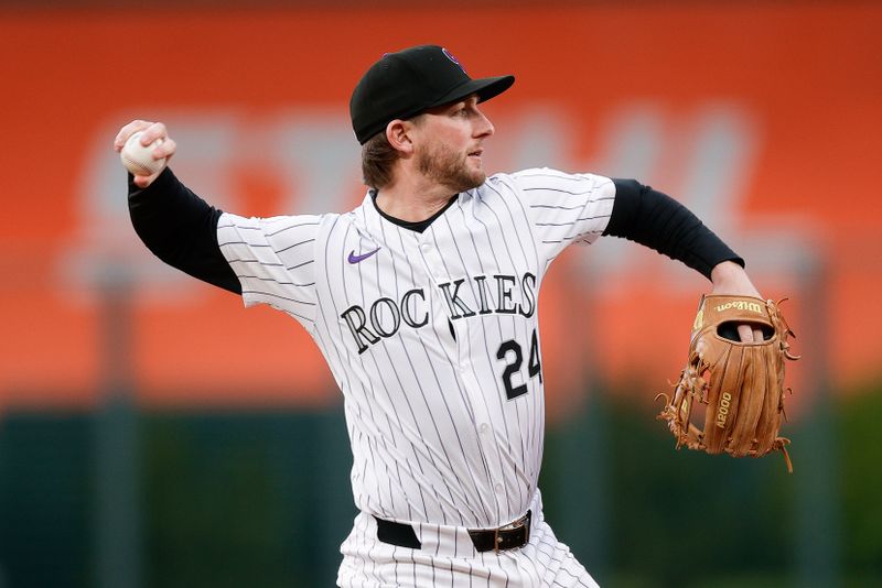 May 10, 2024; Denver, Colorado, USA; Colorado Rockies third baseman Ryan McMahon (24) throws to first for an out in the third inning against the Texas Rangers at Coors Field. Mandatory Credit: Isaiah J. Downing-USA TODAY Sports