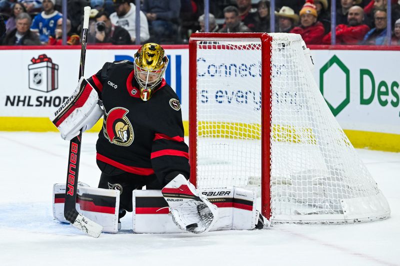 Dec 4, 2025; Ottawa, Ontario, CAN; Ottawa Senators goalie Leevi Merilainen (1) makes a save against the New York Rangers during the second period at Canadian Tire Centre. Mandatory Credit: David Kirouac-Imagn Images