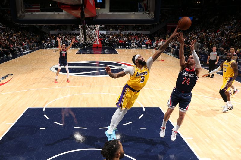 WASHINGTON, DC -? APRIL 3: Anthony Davis #3 of the Los Angeles Lakers blocks the shot by Corey Kispert #24 of the Washington Wizards during the game on April 3, 2024 at Capital One Arena in Washington, DC. NOTE TO USER: User expressly acknowledges and agrees that, by downloading and or using this Photograph, user is consenting to the terms and conditions of the Getty Images License Agreement. Mandatory Copyright Notice: Copyright 2024 NBAE (Photo by Stephen Gosling/NBAE via Getty Images)