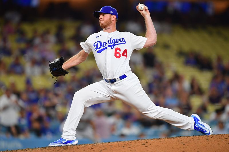 Aug 28, 2023; Los Angeles, California, USA; Los Angeles Dodgers relief pitcher Caleb Ferguson (64) throws against the Arizona Diamondbacks during the ninth inning at Dodger Stadium. Mandatory Credit: Gary A. Vasquez-USA TODAY Sports