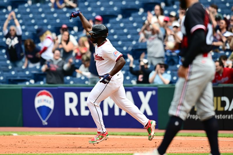 May 1, 2025; Cleveland, Ohio, USA; Cleveland Guardians right fielder Jhonkensy Noel (43) celebrates after hitting a home run during the fourth inning as Minnesota Twins starting pitcher Simeon Woods Richardson (24) walks back to the mound at Progressive Field. Mandatory Credit: Ken Blaze-Imagn Images

