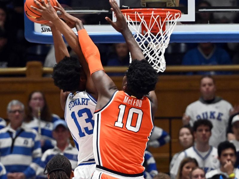 Jan 2, 2024; Durham, North Carolina, USA;  Syracuse Orange center Naheem McLeod (10) blocks the shot of Duke Blue Devils forward Sean Stewart (13) during the first half at Cameron Indoor Stadium. Mandatory Credit: Rob Kinnan-USA TODAY Sports