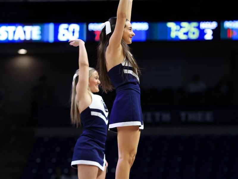 Dec 13, 2025; University Park, Pennsylvania, USA; Penn State cheerleaders perform during the second half against the Michigan State Spartans at Bryce Jordan Center. Mandatory Credit: Matthew O'Haren-Imagn Images