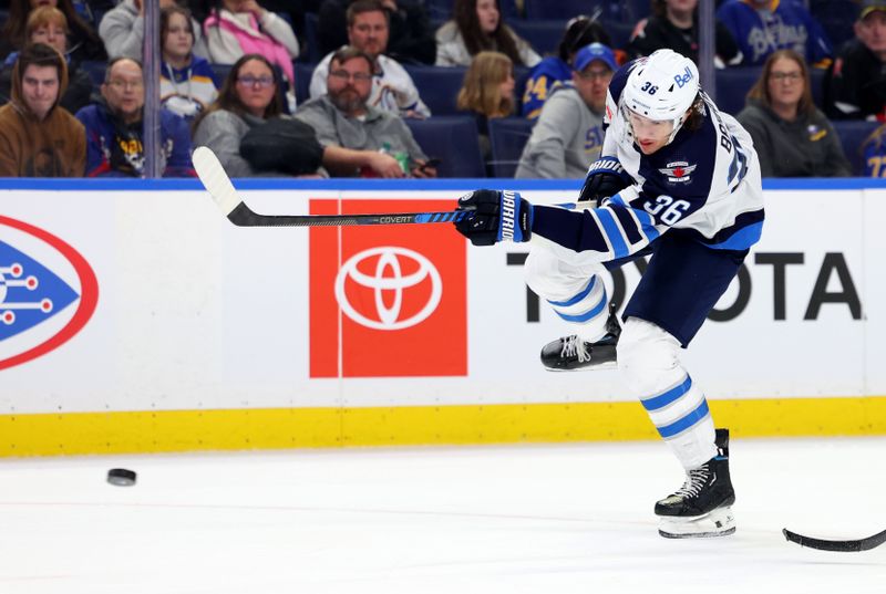 Mar 3, 2024; Buffalo, New York, USA;  Winnipeg Jets center Morgan Barron (36) takes a shot on goal and scores during the third period against the Buffalo Sabres at KeyBank Center. Mandatory Credit: Timothy T. Ludwig-USA TODAY Sports