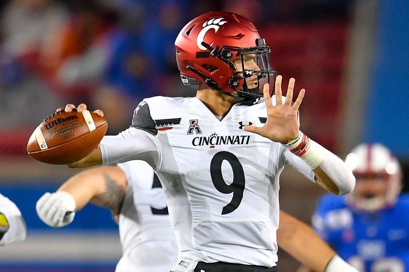 2Oct 24, 2020; Dallas, Texas, USA; Cincinnati Bearcats quarterback Desmond Ridder (9) passes the ball against Southern Methodist Mustangs during the first half at Gerald J. Ford Stadium. Mandatory Credit: Tim Flores-USA TODAY Sports