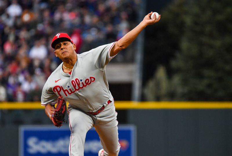 May 13, 2023; Denver, Colorado, USA; Philadelphia Phillies starting pitcher Ranger Suarez (55) delivers a pitch in the first inning against the Colorado Rockies at Coors Field. Mandatory Credit: John Leyba-USA TODAY Sports