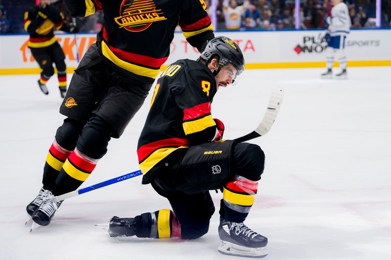 Jan 20, 2024; Vancouver, British Columbia, CAN; Vancouver Canucks forward Conor Garland (8) celebrates a goal against the Toronto Maple Leafs in the first period at Rogers Arena. Mandatory Credit: Bob Frid-USA TODAY Sports