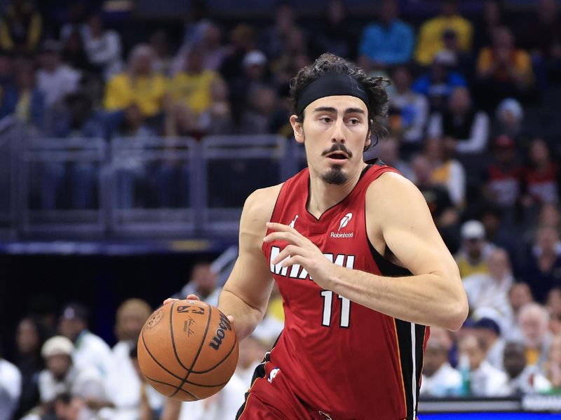 INDIANAPOLIS, INDIANA - NOVEMBER 17: Jaime Jaquez Jr. #11 of the Miami Heat  drives to the basket during the first quarter against the Indiana Pacers at Gainbridge Fieldhouse on November 17, 2024 in Indianapolis, Indiana. NOTE TO USER: User expressly acknowledges and agrees that, by downloading and or using this photograph, User is consenting to the terms and conditions of the Getty Images License Agreement. (Photo by Justin Casterline/Getty Images)