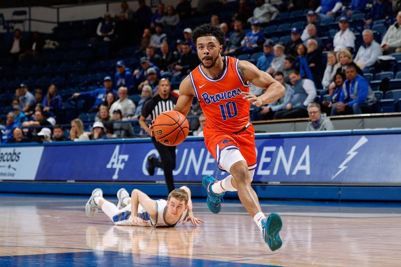 Jan 31, 2023; Colorado Springs, Colorado, USA; Boise State Broncos guard Marcus Shaver Jr. (10) drives to the net ahead of Air Force Falcons guard Jake Heidbreder (3) in the first half at Clune Arena. Mandatory Credit: Isaiah J. Downing-USA TODAY Sports