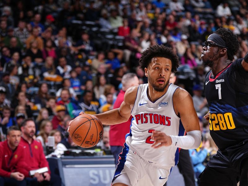 DENVER, CO - JANUARY 7: Cade Cunningham #2 of the Detroit Pistons drives to the basket during the game against the Denver Nuggets on January 7, 2024 at the Ball Arena in Denver, Colorado. NOTE TO USER: User expressly acknowledges and agrees that, by downloading and/or using this Photograph, user is consenting to the terms and conditions of the Getty Images License Agreement. Mandatory Copyright Notice: Copyright 2024 NBAE (Photo by Garrett Ellwood/NBAE via Getty Images)