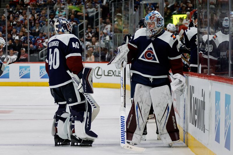 Apr 13, 2024; Denver, Colorado, USA; Colorado Avalanche goaltender Justus Annunen (60) comes on for goaltender Alexandar Georgiev (40) in the first period at Ball Arena. Mandatory Credit: Isaiah J. Downing-USA TODAY Sports