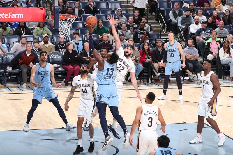 MEMPHIS, TN - FEBRUARY 12: Jaren Jackson Jr. #13 of the Memphis Grizzlies drives to the basket during the game against the New Orleans Pelicans on February 12, 2024 at FedExForum in Memphis, Tennessee. NOTE TO USER: User expressly acknowledges and agrees that, by downloading and or using this photograph, User is consenting to the terms and conditions of the Getty Images License Agreement. Mandatory Copyright Notice: Copyright 2024 NBAE (Photo by Joe Murphy/NBAE via Getty Images)