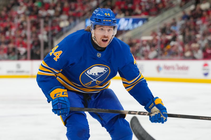 Nov 8, 2025; Raleigh, North Carolina, USA;  Buffalo Sabres center Josh Dunne (44) watches the play against the Carolina Hurricanes during the second period at Lenovo Center. Mandatory Credit: James Guillory-Imagn Images