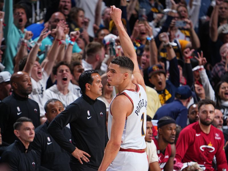 DENVER, CO - JUNE 12: Michael Porter Jr. #1 of the Denver Nuggets celebrates a three point basket against the Miami Heat during Game Five of the 2023 NBA Finals on June 12, 2023 at Ball Arena in Denver, Colorado. NOTE TO USER: User expressly acknowledges and agrees that, by downloading and or using this Photograph, user is consenting to the terms and conditions of the Getty Images License Agreement. Mandatory Copyright Notice: Copyright 2023 NBAE (Photo by Garrett Ellwood/NBAE via Getty Images)