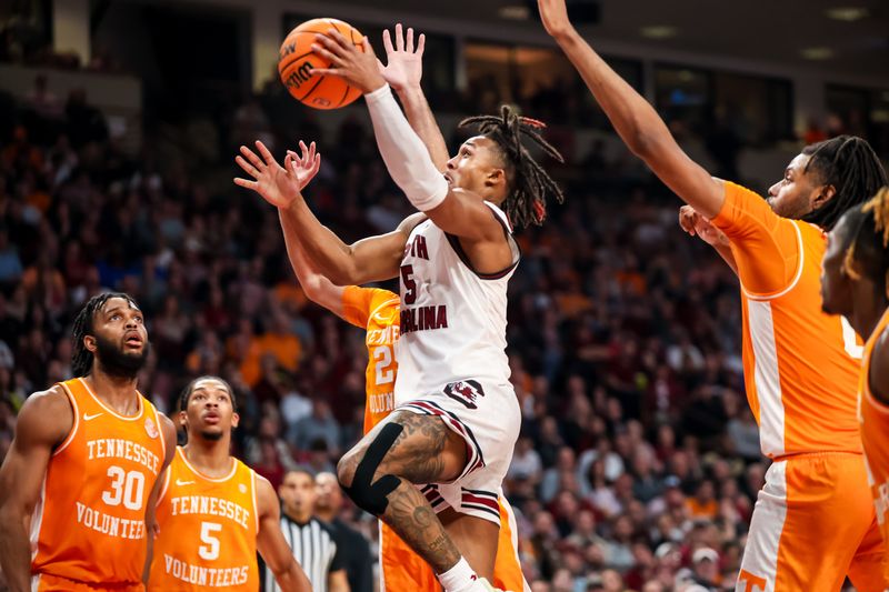 Mar 6, 2024; Columbia, South Carolina, USA; South Carolina Gamecocks guard Meechie Johnson (5) drives against the Tennessee Volunteers in the second half at Colonial Life Arena. Mandatory Credit: Jeff Blake-USA TODAY Sports