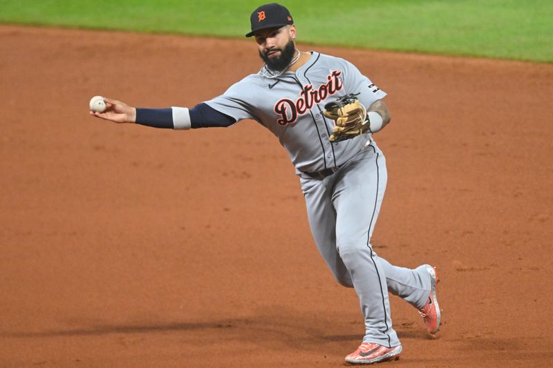 Sep 25, 2025; Cleveland, Ohio, USA; Detroit Tigers second baseman Gleyber Torres (25) throws to first base in the fourth inning against the Cleveland Guardians at Progressive Field. Mandatory Credit: David Richard-Imagn Images