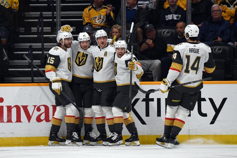 Mar 26, 2024; Nashville, Tennessee, USA; Vegas Golden Knights center Ivan Barbashev (49) celebrates with teammates after a goal during the first period against the Nashville Predators at Bridgestone Arena. Mandatory Credit: Christopher Hanewinckel-USA TODAY Sports