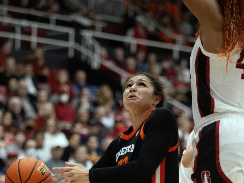 Jan 21, 2024; Stanford, California, USA; Oregon State Beavers guard Talia von Oelhoffen (left) looks to shoot around Stanford Cardinal forward Kiki Iriafen (44) during the first quarter at Maples Pavilion. Mandatory Credit: D. Ross Cameron-USA TODAY Sports