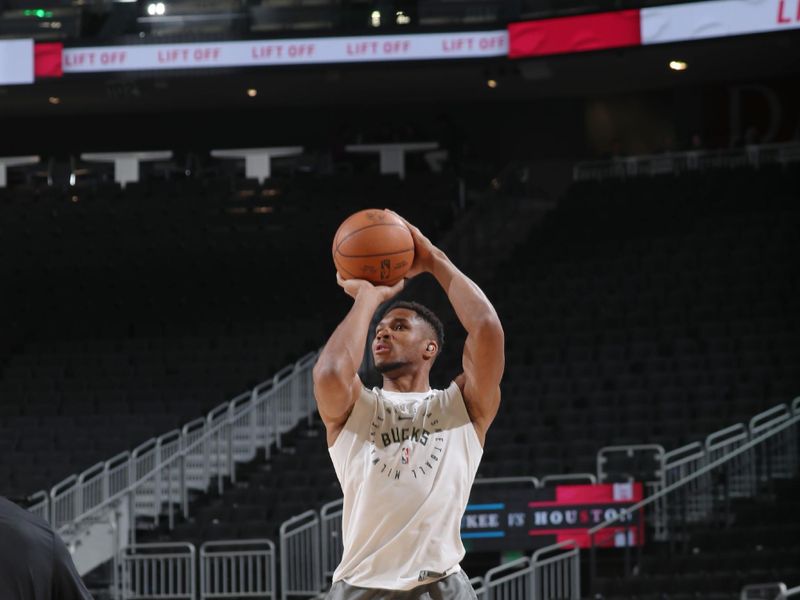 MILWAUKEE, WI - NOVEMBER 18: Giannis Antetokounmpo #34 of the Milwaukee Bucks warms up before the game against the Houston Rockets on November 18, 2024 at the Fiserv Forum Center in Milwaukee, Wisconsin. NOTE TO USER: User expressly acknowledges and agrees that, by downloading and or using this Photograph, user is consenting to the terms and conditions of the Getty Images License Agreement. Mandatory Copyright Notice: Copyright 2024 NBAE (Photo by Gary Dineen/NBAE via Getty Images).