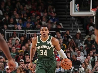 MILWAUKEE, WI - DECEMBER 11:  Giannis Antetokounmpo #34 of the Milwaukee Bucks handles the ball during the game  on December 11, 2023 at the Fiserv Forum Center in Milwaukee, Wisconsin. NOTE TO USER: User expressly acknowledges and agrees that, by downloading and or using this Photograph, user is consenting to the terms and conditions of the Getty Images License Agreement. Mandatory Copyright Notice: Copyright 2023 NBAE (Photo by Gary Dineen/NBAE via Getty Images).