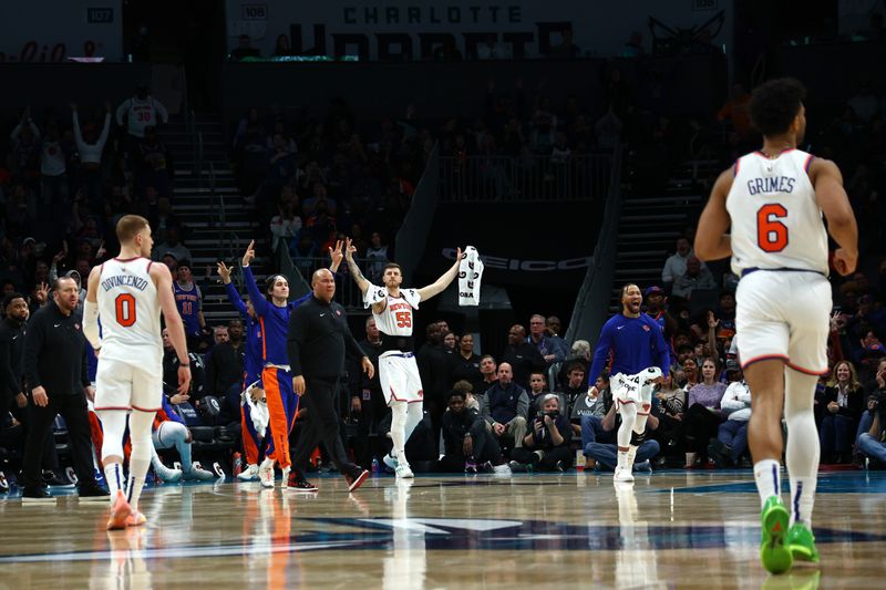 CHARLOTTE, NORTH CAROLINA - JANUARY 29: The New York Knicks bench reacts following a basket during the second half of the game against the Charlotte Hornets at Spectrum Center on January 29, 2024 in Charlotte, North Carolina. NOTE TO USER: User expressly acknowledges and agrees that, by downloading and or using this photograph, User is consenting to the terms and conditions of the Getty Images License Agreement. (Photo by Jared C. Tilton/Getty Images)