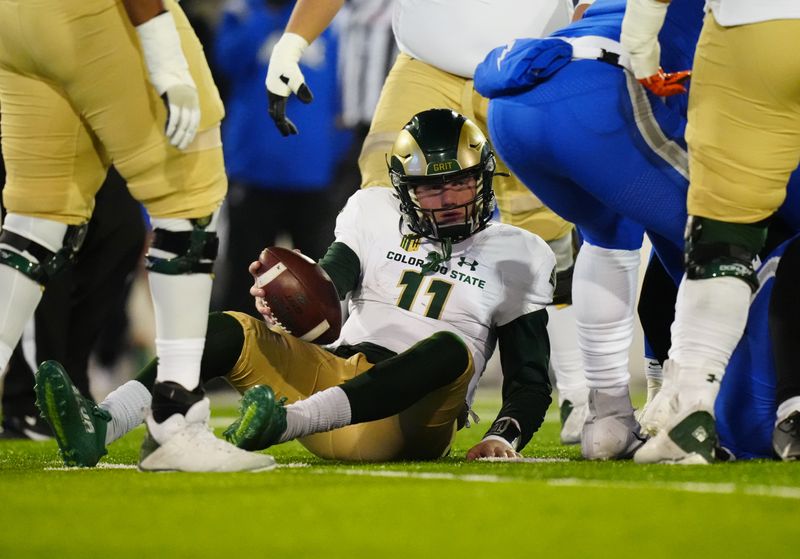 Nov 19, 2022; Colorado Springs, Colorado, USA; Colorado State Rams quarterback Clay Millen (11) lays on the turf after being sacked by the Air Force Falcons fourth quarter at Falcon Stadium. Mandatory Credit: Ron Chenoy-USA TODAY Sports