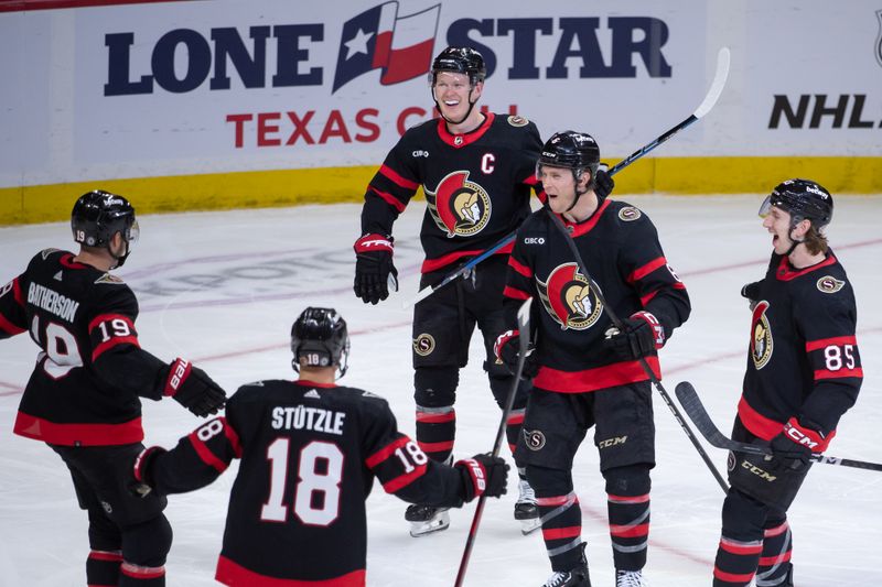 Mar 24, 2024; Ottawa, Ontario, CAN; Ottawa Senators defenseman Jakob Chychrun (6) celebrates with team his goal scored in the third period against the Edmonton Oilers in the third period at the Canadian Tire Centre. Mandatory Credit: Marc DesRosiers-USA TODAY Sports