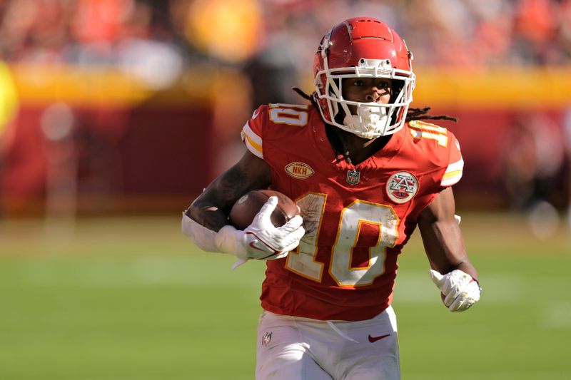 Kansas City Chiefs running back Isiah Pacheco runs the ball during the first half of an NFL football game against the Chicago Bears Sunday, Sept. 24, 2023, in Kansas City, Mo. (AP Photo/Charlie Riedel)