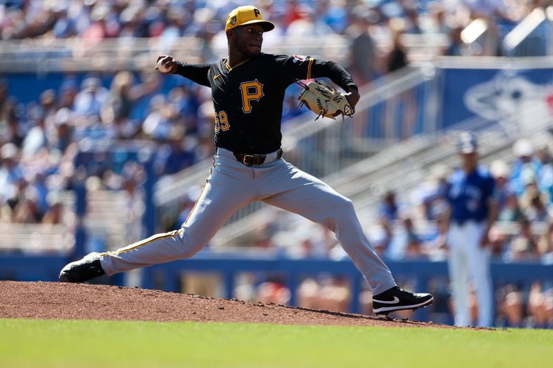 Feb 26, 2024; Dunedin, Florida, USA;  Pittsburgh Pirates starting pitcher Roansy Contreras (59) throws a pitch against the Toronto Blue Jays in the second inning at TD Ballpark. Mandatory Credit: Nathan Ray Seebeck-USA TODAY Sports