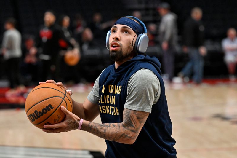 PORTLAND, OREGON - APRIL 09: Jose Alvarado #15 of the New Orleans Pelicans warms up before the game against the Portland Trail Blazers at the Moda Center on April 09, 2024 in Portland, Oregon. NOTE TO USER: User expressly acknowledges and agrees that, by downloading and or using this photograph, User is consenting to the terms and conditions of the Getty Images License Agreement. (Photo by Alika Jenner/Getty Images)