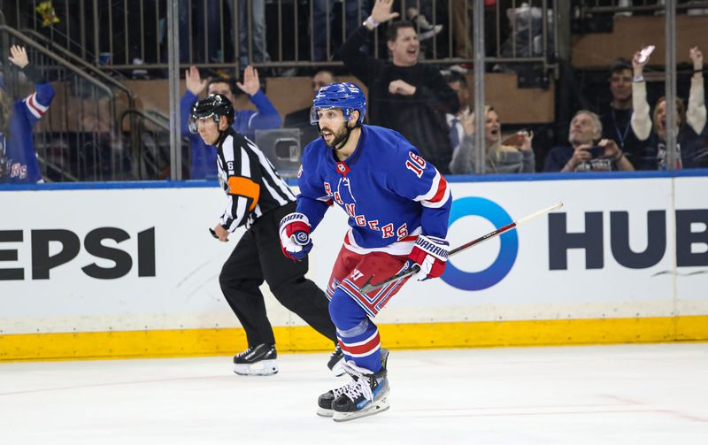 Jan 18, 2025; New York, New York, USA; New York Rangers center Vincent Trocheck (16) celebrates his game-winning goal on Columbus Blue Jackets goalie Daniil Tarasov (40) in a shootout at Madison Square Garden. Mandatory Credit: Danny Wild-Imagn Images