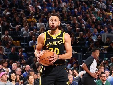 SAN FRANCISCO, CA - DECEMBER 19: Stephen Curry #30 of the Golden State Warriors looks on during the game against the Boston Celtics on December 19, 2023 at Chase Center in San Francisco, California. NOTE TO USER: User expressly acknowledges and agrees that, by downloading and or using this photograph, user is consenting to the terms and conditions of Getty Images License Agreement. Mandatory Copyright Notice: Copyright 2023 NBAE (Photo by Mike Rasay/NBAE via Getty Images)