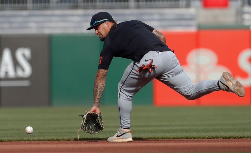 Apr 8, 2024; Pittsburgh, Pennsylvania, USA;  Detroit Tigers shortstop Javier Báez (28) fields ground balls before the game against the Pittsburgh Pirates at PNC Park. Mandatory Credit: Charles LeClaire-USA TODAY Sports