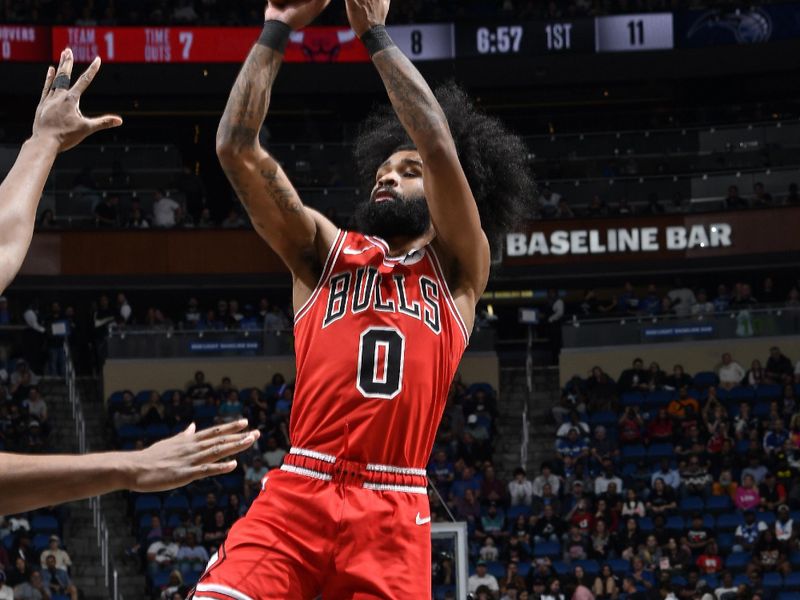 ORLANDO, FL - FEBRUARY 10: Coby White #0 of the Chicago Bulls shoots the ball during the game against the Orlando Magic on February 10, 2024 at the Kia Center in Orlando, Florida. NOTE TO USER: User expressly acknowledges and agrees that, by downloading and or using this photograph, User is consenting to the terms and conditions of the Getty Images License Agreement. Mandatory Copyright Notice: Copyright 2024 NBAE (Photo by Fernando Medina/NBAE via Getty Images)