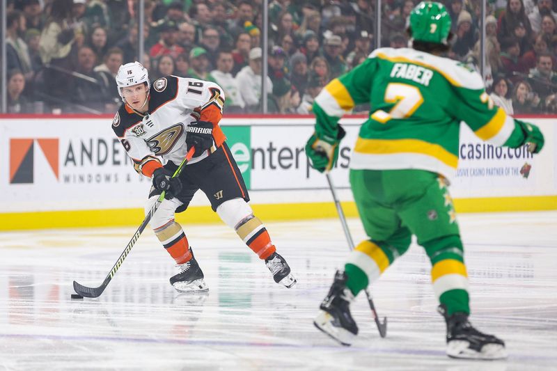 Jan 27, 2024; Saint Paul, Minnesota, USA; Anaheim Ducks center Ryan Strome (16) skates with the puck as Minnesota Wild defenseman Brock Faber (7) defends during the first period at Xcel Energy Center. Mandatory Credit: Matt Krohn-USA TODAY Sports