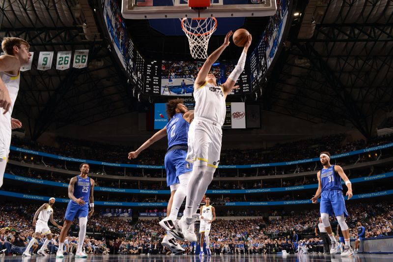 DALLAS, TX - OCTOBER 28: Walker Kessler #24 of the Utah Jazz drives to the basket during the game against the Dallas Mavericks on October 28, 2024 at American Airlines Center in Dallas, Texas. NOTE TO USER: User expressly acknowledges and agrees that, by downloading and or using this photograph, User is consenting to the terms and conditions of the Getty Images License Agreement. Mandatory Copyright Notice: Copyright 2024 NBAE (Photo by Glenn James/NBAE via Getty Images)