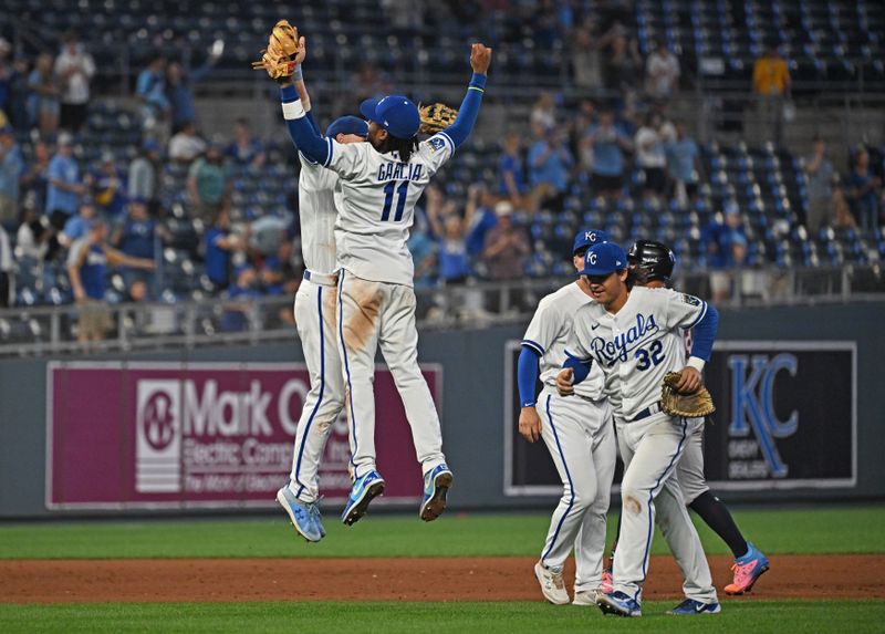 Sep 19, 2023; Kansas City, Missouri, USA; Kansas City Royals players celebrate after beating the Cleveland Guardians at Kauffman Stadium. Mandatory Credit: Peter Aiken-USA TODAY Sports