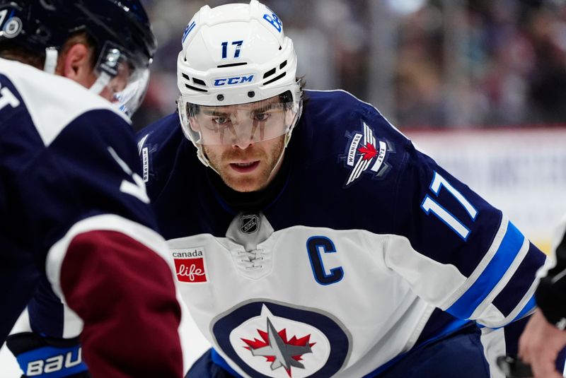 Dec 31, 2024; Denver, Colorado, USA; Winnipeg Jets center Adam Lowry (17) during the third period against the Colorado Avalanche at Ball Arena. Mandatory Credit: Ron Chenoy-Imagn Images