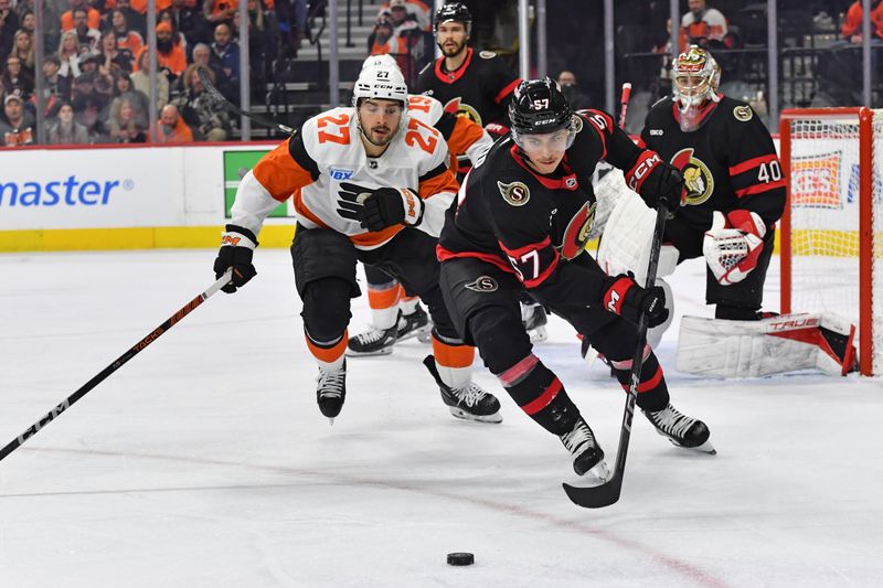Mar 2, 2024; Philadelphia, Pennsylvania, USA; Ottawa Senators center Shane Pinto (57) and Philadelphia Flyers left wing Noah Cates (27) battle for the puck during the first period at Wells Fargo Center. Mandatory Credit: Eric Hartline-USA TODAY Sports