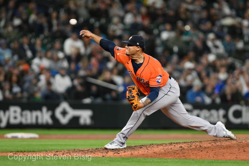 Sep 27, 2023; Seattle, Washington, USA; Houston Astros relief pitcher Bryan Abreu (52) pitches to the Seattle Mariners during the seventh inning at T-Mobile Park. Mandatory Credit: Steven Bisig-USA TODAY Sports