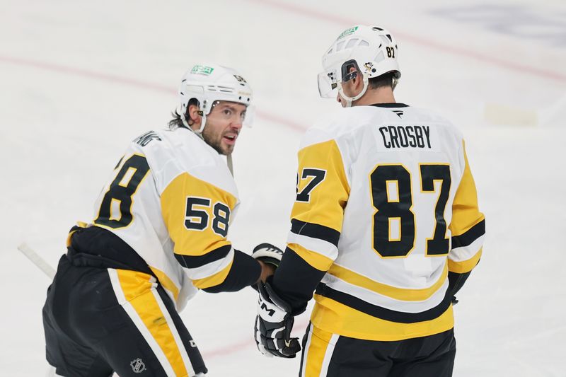 Nov 1, 2025; Winnipeg, Manitoba, CAN; Pittsburgh Penguins defenseman Kris Letang (58) and center Sidney Crosby (87) talk before a game against the Winnipeg Jetsat Canada Life Centre. Mandatory Credit: James Carey Lauder-Imagn Images Nov 1, 2025; Winnipeg, Manitoba, CAN; Pittsburgh Penguins defenseman Kris Letang (58) and center Sidney Crosby (87) talk before a game against the Winnipeg Jetsat Canada Life Centre. Mandatory Credit: James Carey Lauder-Imagn Images
