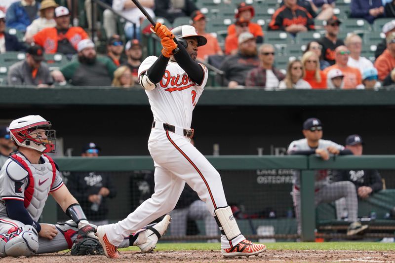 Apr 17, 2024; Baltimore, Maryland, USA; Baltimore Orioles outfielder Cedric Mullins (31) connects on his game winning two run home run in the ninth inning against the Minnesota Twins at Oriole Park at Camden Yards. Mandatory Credit: Mitch Stringer-USA TODAY Sports