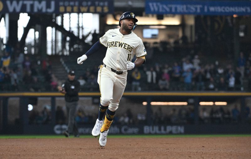 Apr 3, 2024; Milwaukee, Wisconsin, USA; Milwaukee Brewers right fielder Jackson Chourio (11) rounds the bases after hitting his first Major League home run against the Minnesota Twins in the fifth inning at American Family Field. Mandatory Credit: Michael McLoone-USA TODAY Sports