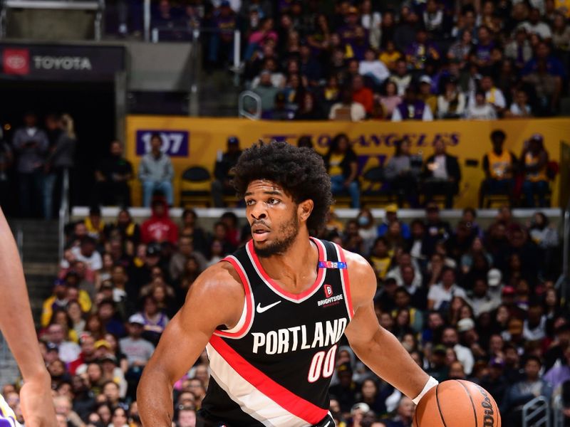 LOS ANGELES, CA - DECEMBER 8: Scoot Henderson #00 of the Portland Trail Blazers dribbles the ball during the game against the Los Angeles Lakers on December 8, 2024 at Crypto.Com Arena in Los Angeles, California. NOTE TO USER: User expressly acknowledges and agrees that, by downloading and/or using this Photograph, user is consenting to the terms and conditions of the Getty Images License Agreement. Mandatory Copyright Notice: Copyright 2024 NBAE (Photo by Adam Pantozzi/NBAE via Getty Images)