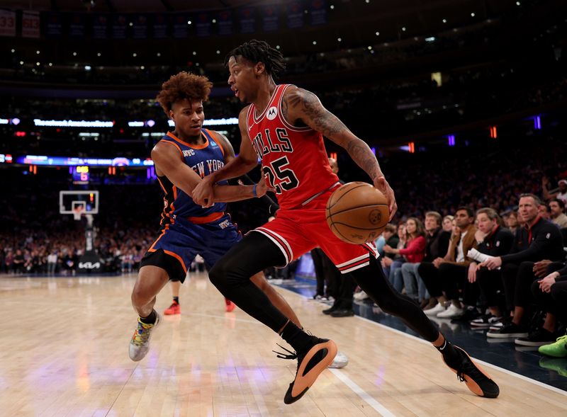 NEW YORK, NEW YORK - APRIL 14:  Dalen Terry #25 of the Chicago Bulls heads for the net as Miles McBride #2 of the New York Knicks defends during the second half at Madison Square Garden on April 14, 2024 in New York City. The New York Knicks defeated the Chicago Bulls 120-119 in OT. NOTE TO USER: User expressly acknowledges and agrees that, by downloading and or using this photograph, User is consenting to the terms and conditions of the Getty Images License Agreement. (Photo by Elsa/Getty Images)