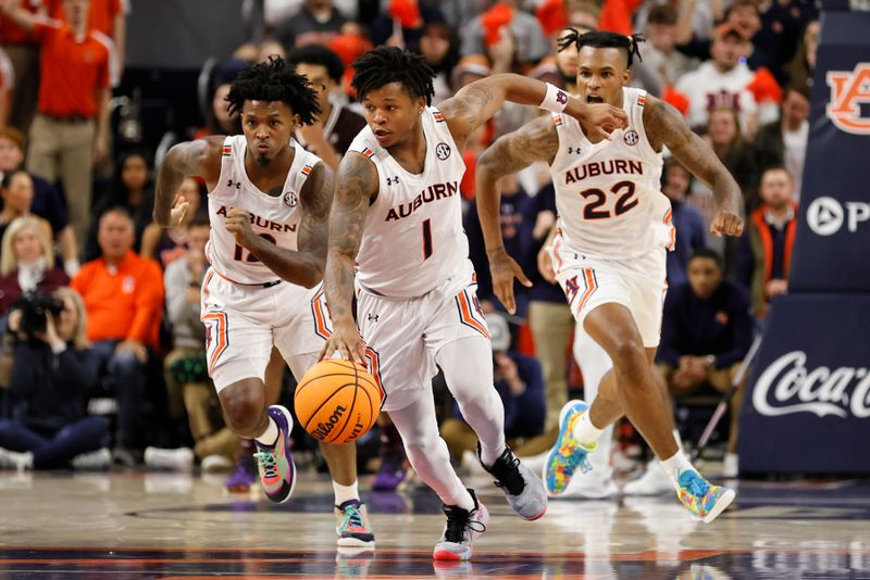 Jan 14, 2023; Auburn, Alabama, USA;  Auburn Tigers guard Wendell Green Jr. (1) controls a loose ball and runs down the court against the Mississippi State Bulldogs during the second half at Neville Arena. Mandatory Credit: John Reed-USA TODAY Sports