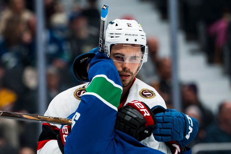 Mar 9, 2026; Vancouver, British Columbia, CAN; Ottawa Senators defenseman Artem Zub (2) wrestles with Vancouver Canucks forward Linus Karlsson (94) after the whistle in the second period at Rogers Arena. Mandatory Credit: Bob Frid-Imagn Images