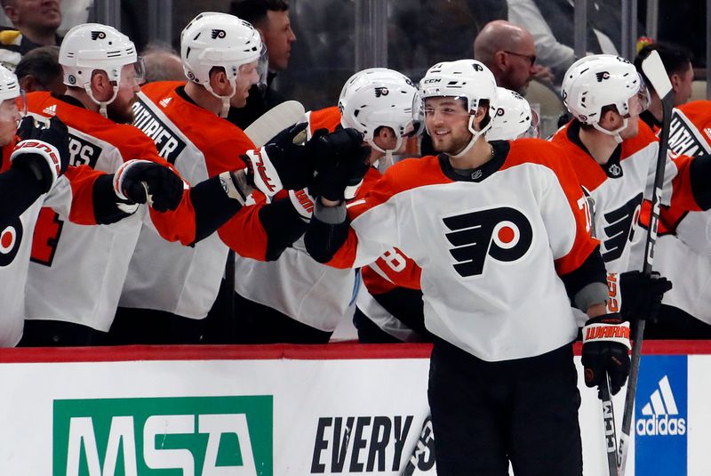 Feb 25, 2024; Pittsburgh, Pennsylvania, USA;  Philadelphia Flyers right wing Tyson Foerster (71) celebrates his goal with the Flyers bench against the Pittsburgh Penguins during the second period at PPG Paints Arena. Mandatory Credit: Charles LeClaire-USA TODAY Sports